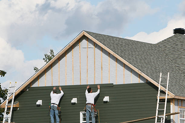 Professional Siding technician working in Warminster, PA